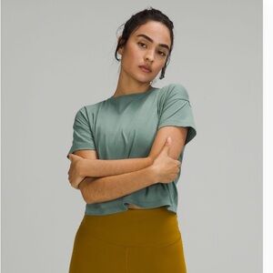 Cates Tee size 10 in Tidewater Teal (some discoloration)